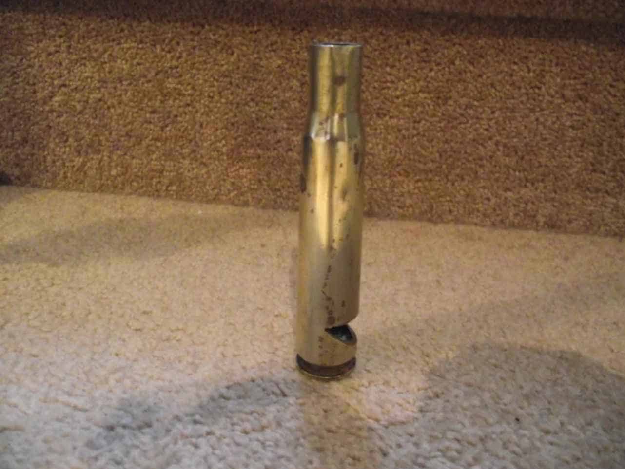 Bullet bottle opener