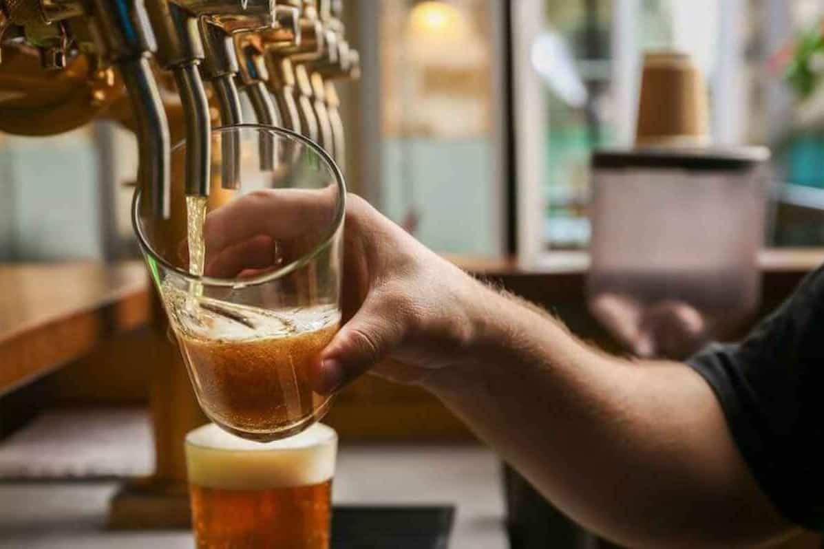 How To Pour A Beer Into A Glass The Right Way