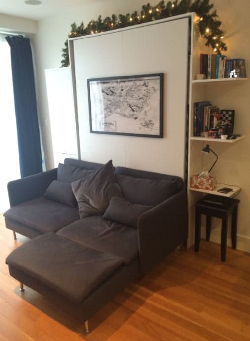 Murphy Bed Tucked Away Behind A Sofa