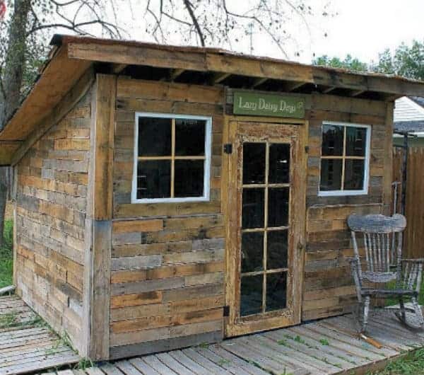 Rustic Shed Made From Pallets and Tin Cans