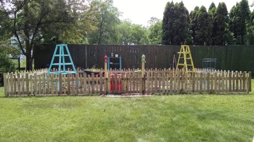 DIY Dog Fence with Reclaimed Pallets